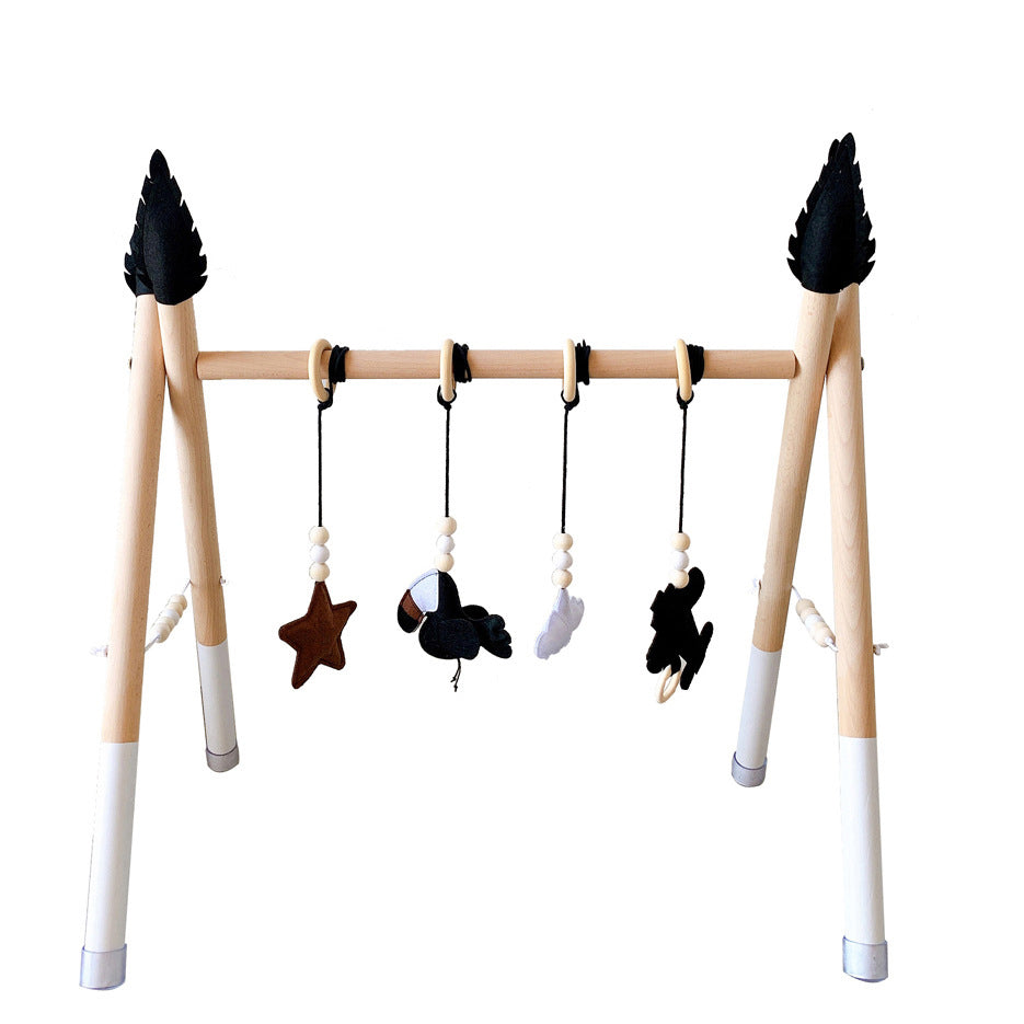 Play arch baby gym made of wood and felt - airplane toucan